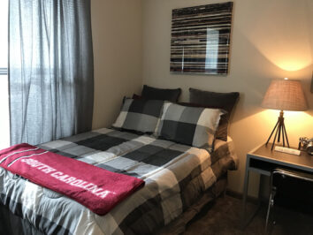 Apartment bedroom with bed