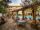 Decorative wooden beams near a pool