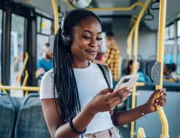 young woman riding a bus